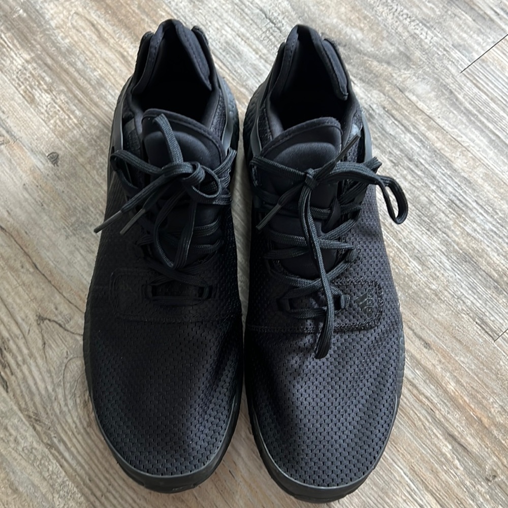 Adidas.  Black athletic sneaker.  Worn once.